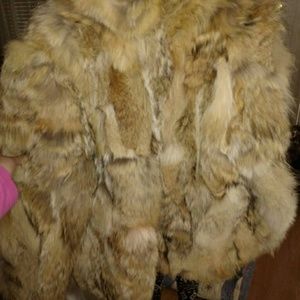 100 percent rabbit fur , silk inside